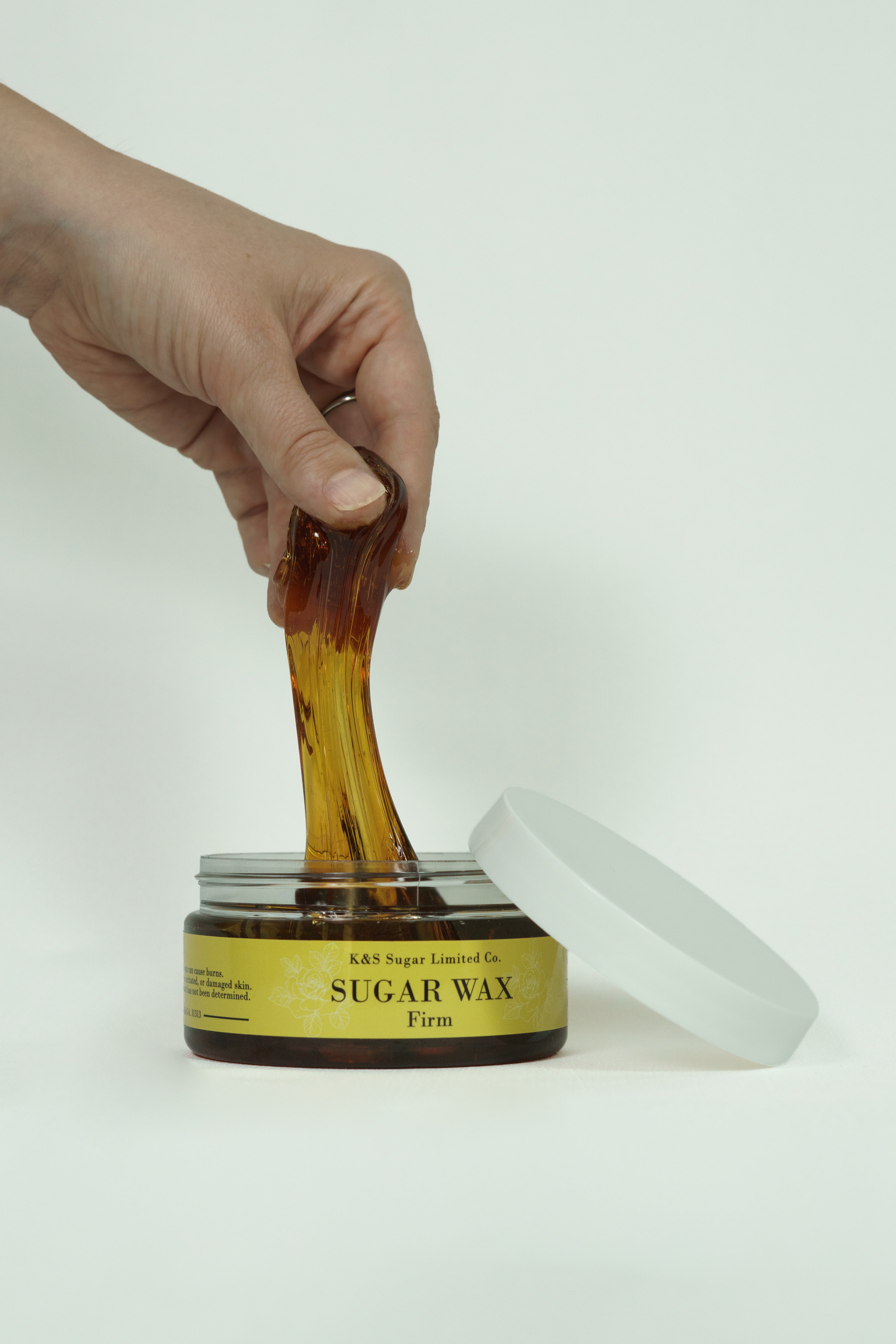 Firm sugar wax